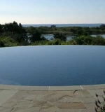 60' circular pool in the sky with vanishing edge.