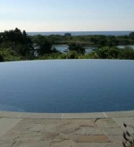 60' circular pool in the sky with vanishing edge.