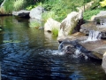 A. Waterfall flows into lagoon